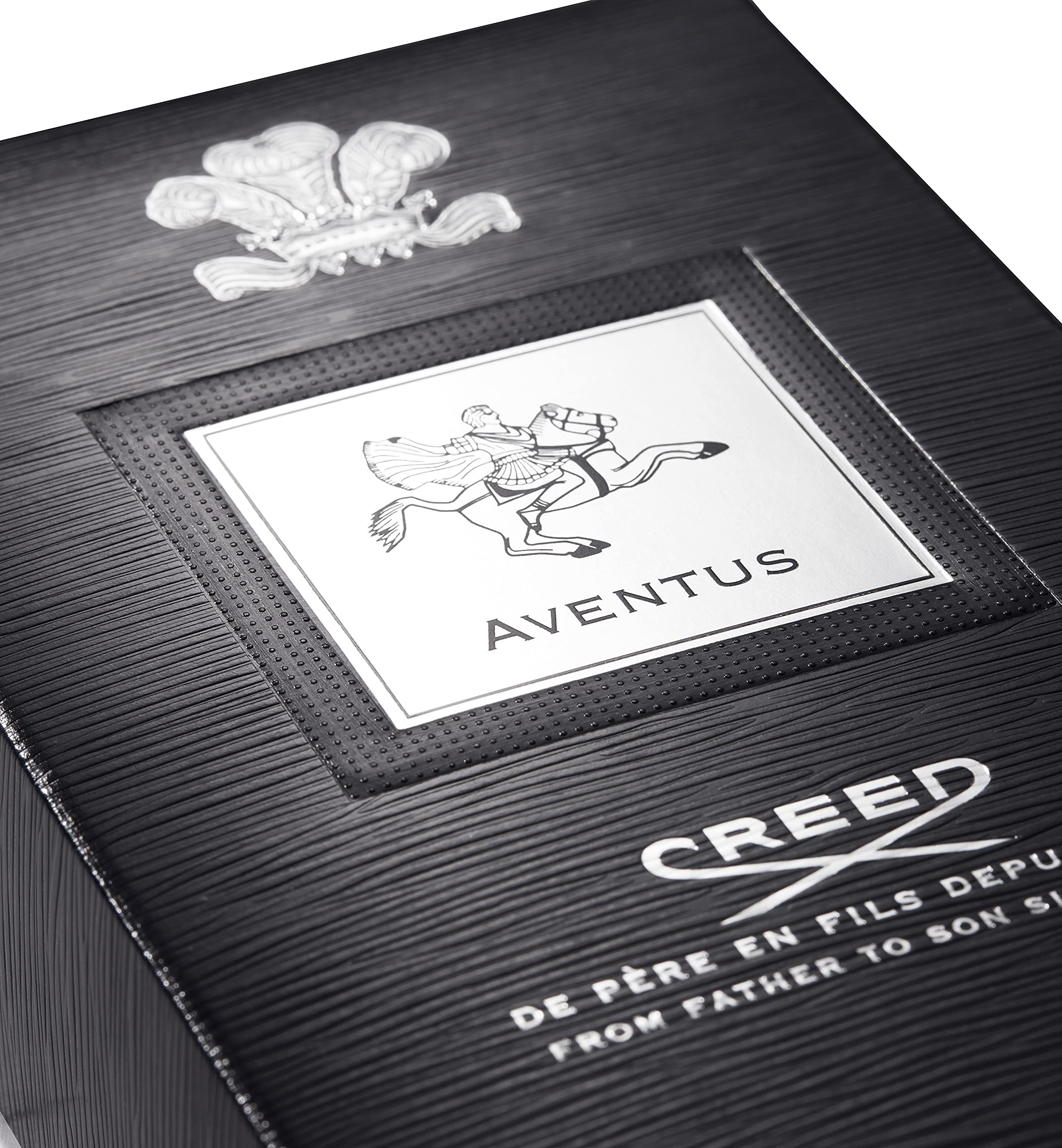 Creed Aventus being sprayed on wrist at pulse point, brand ensures lasting projection