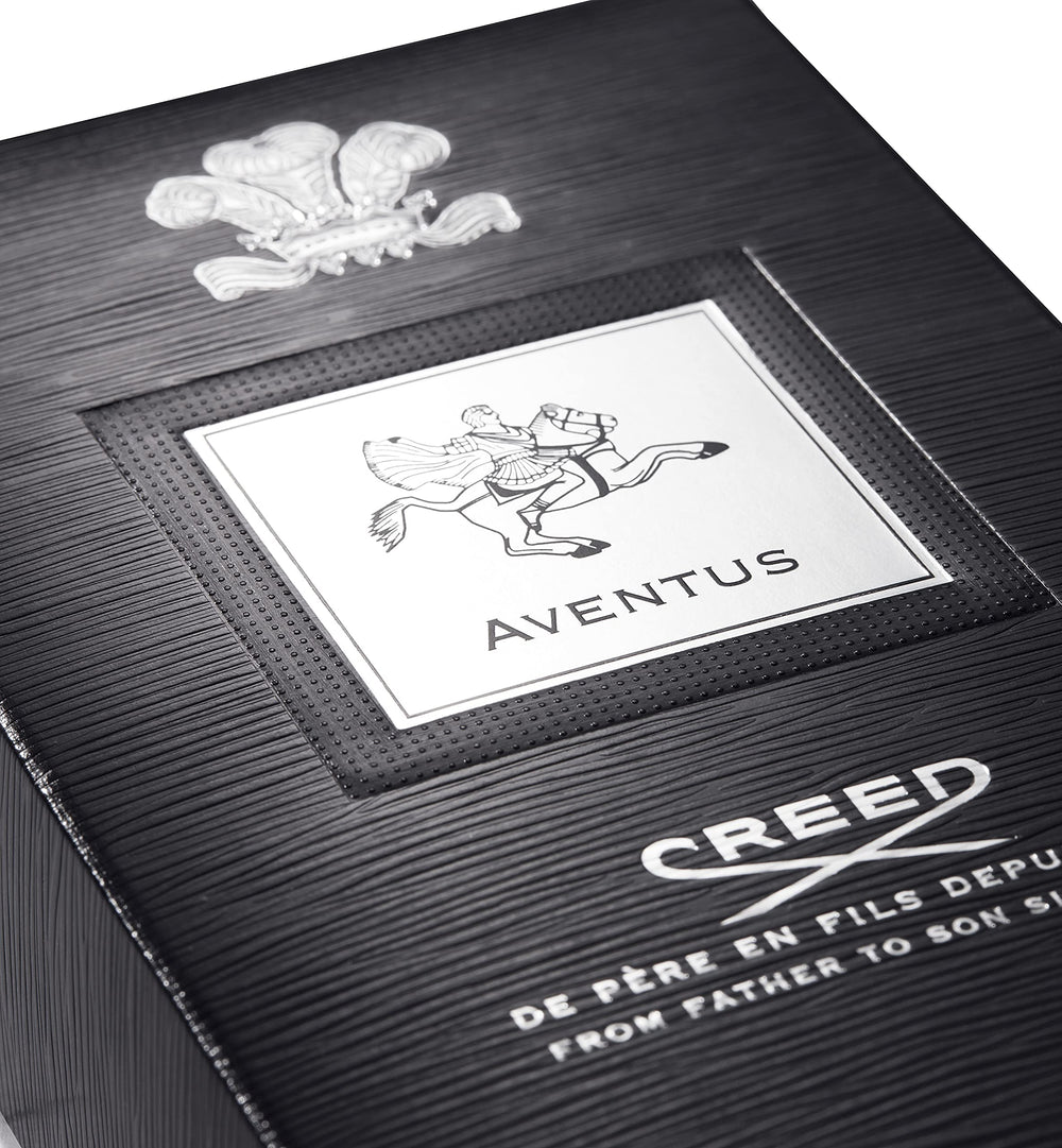 Creed Aventus being sprayed on wrist at pulse point, brand ensures lasting projection