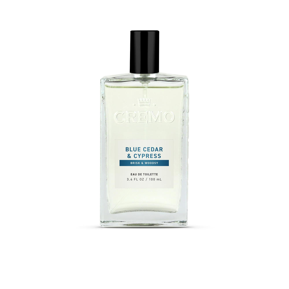 Cremo bottle front view showing woodsy citrus fragrance and clean design