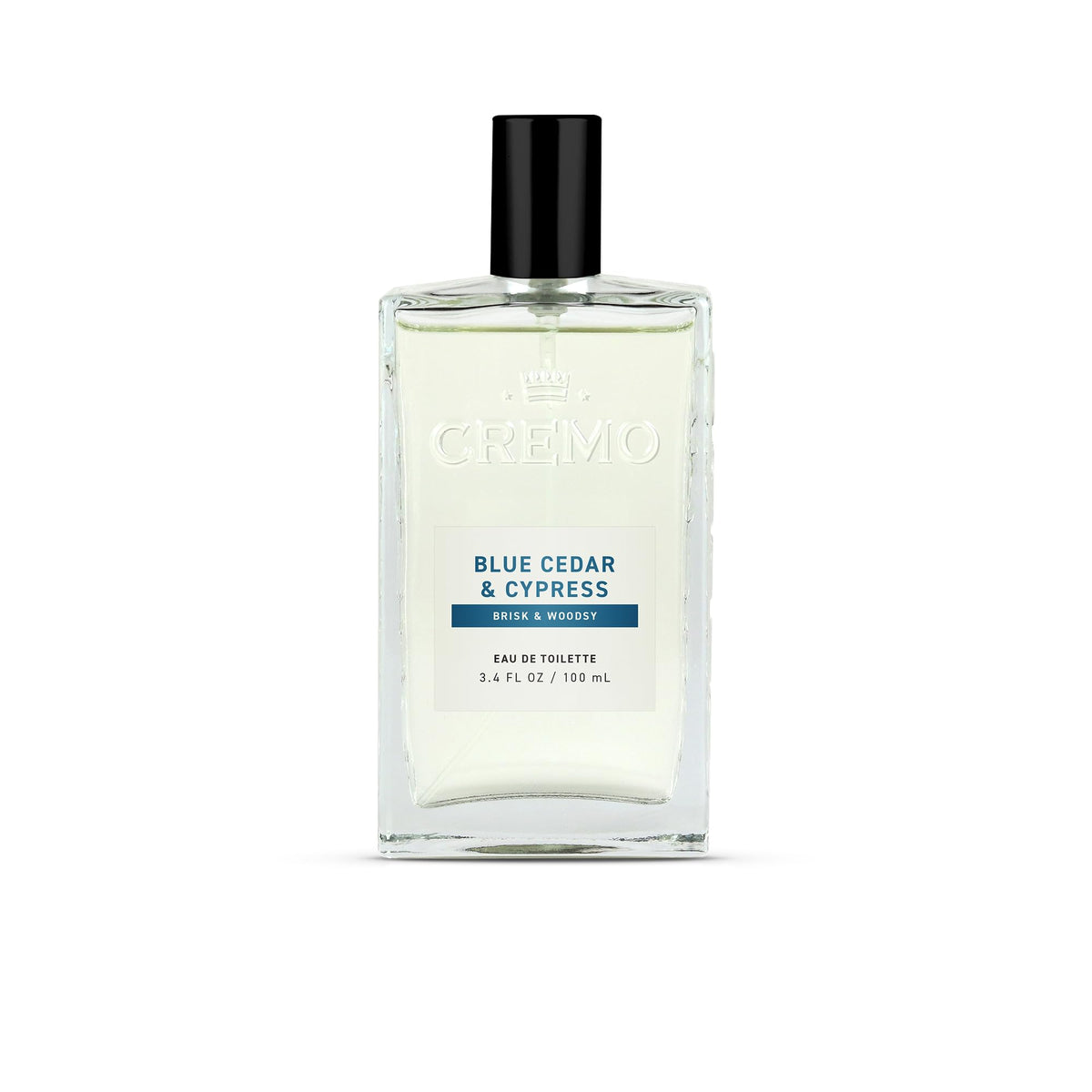 Cremo bottle front view showing woodsy citrus fragrance and clean design
