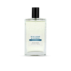 Cremo bottle front view showing woodsy citrus fragrance and clean design