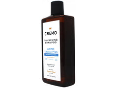 Cremo close-up of label detail highlighting scent notes and premium formula benefit