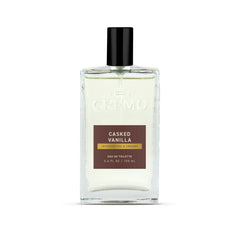 Cremo front bottle view showing sleek label and spray benefit of easy application