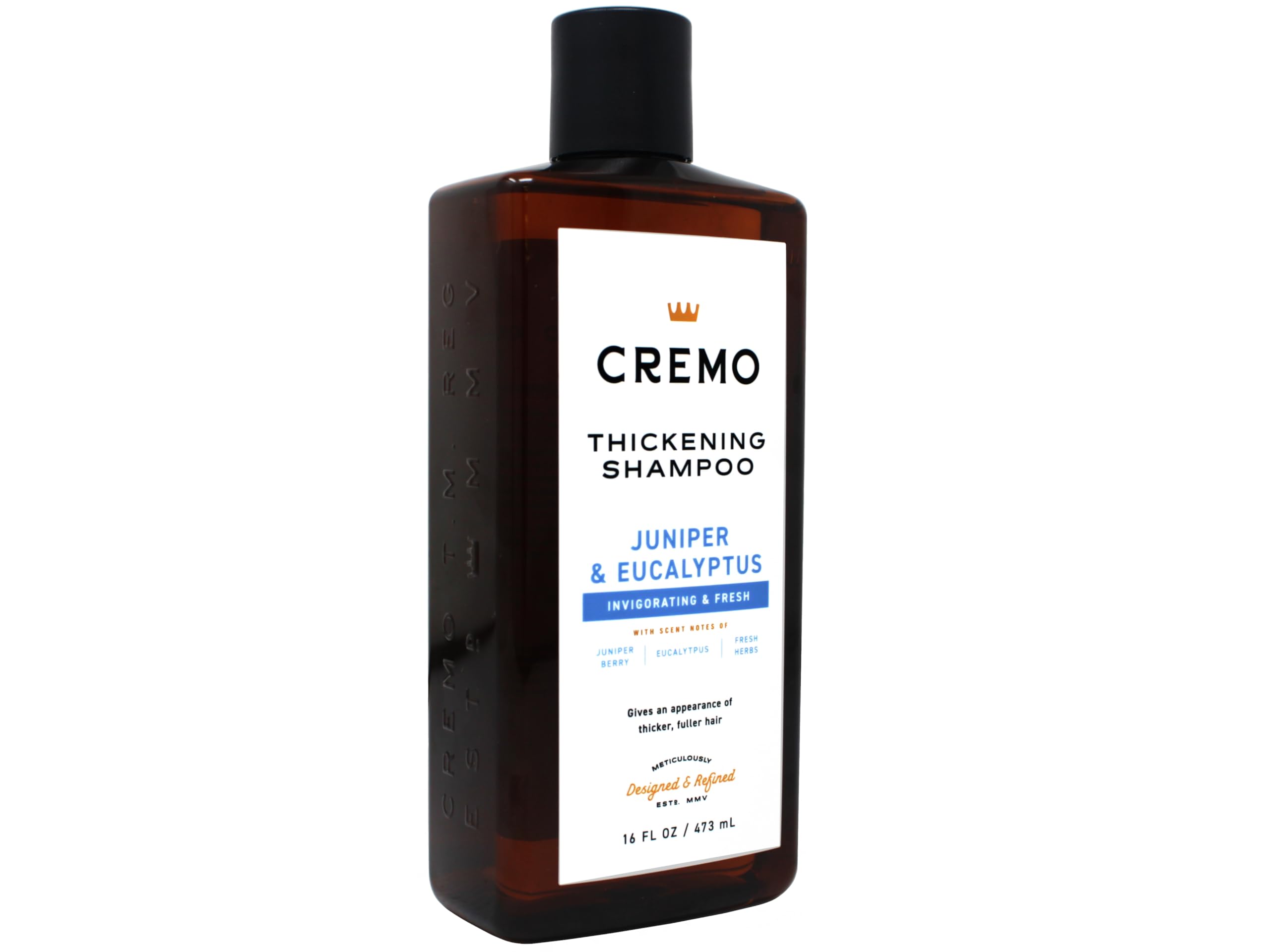 Cremo bottle held in hand for size comparison showing generous 16 fl oz supply benefit