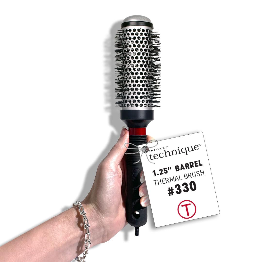 Cricket front view showing 1.25" barrel and ergonomic handle for controlled styling