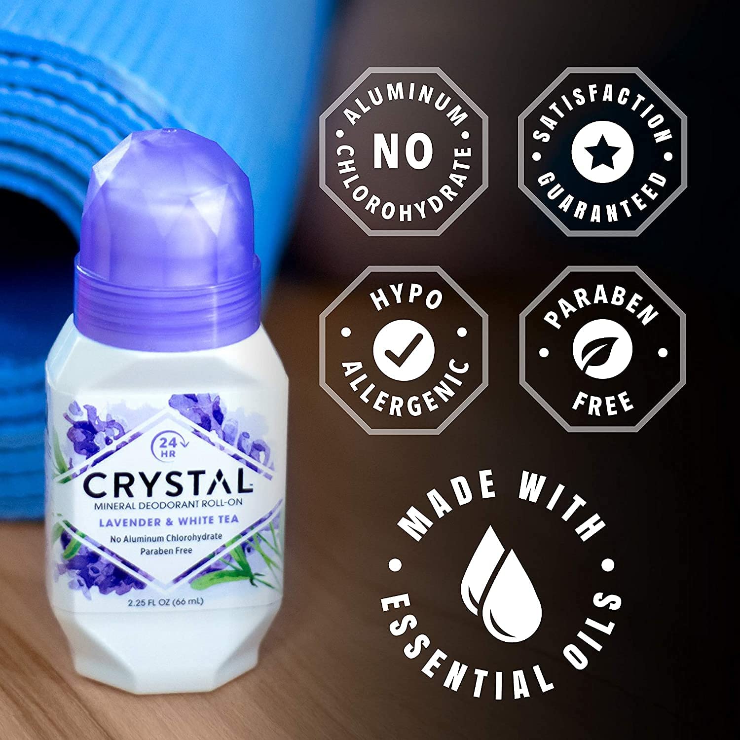 Crystal Essence bottle in hand for scale showing compact travel benefit