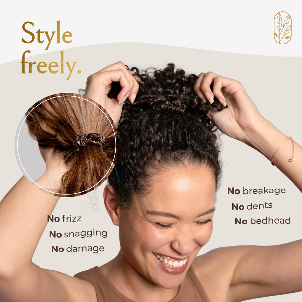 Curlfriend Collective scrunchie on pillow in sleep setting showing comfortable nighttime protection