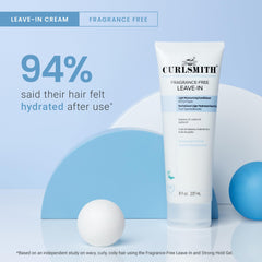 CURLSMITH applying leave-in to damp curls showing ease of use and definition