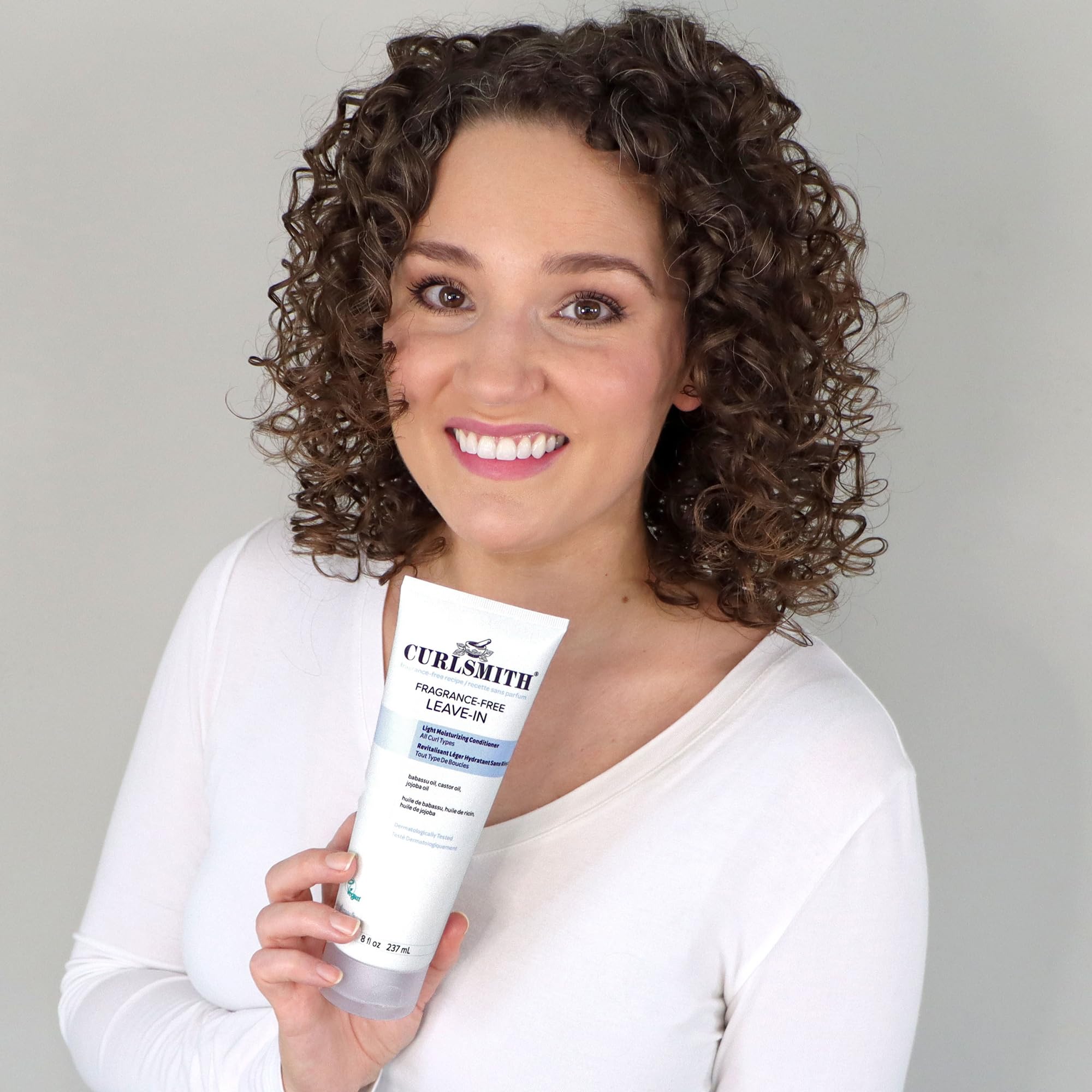CURLSMITH label close-up highlighting dermatologically tested and 0% fragrance