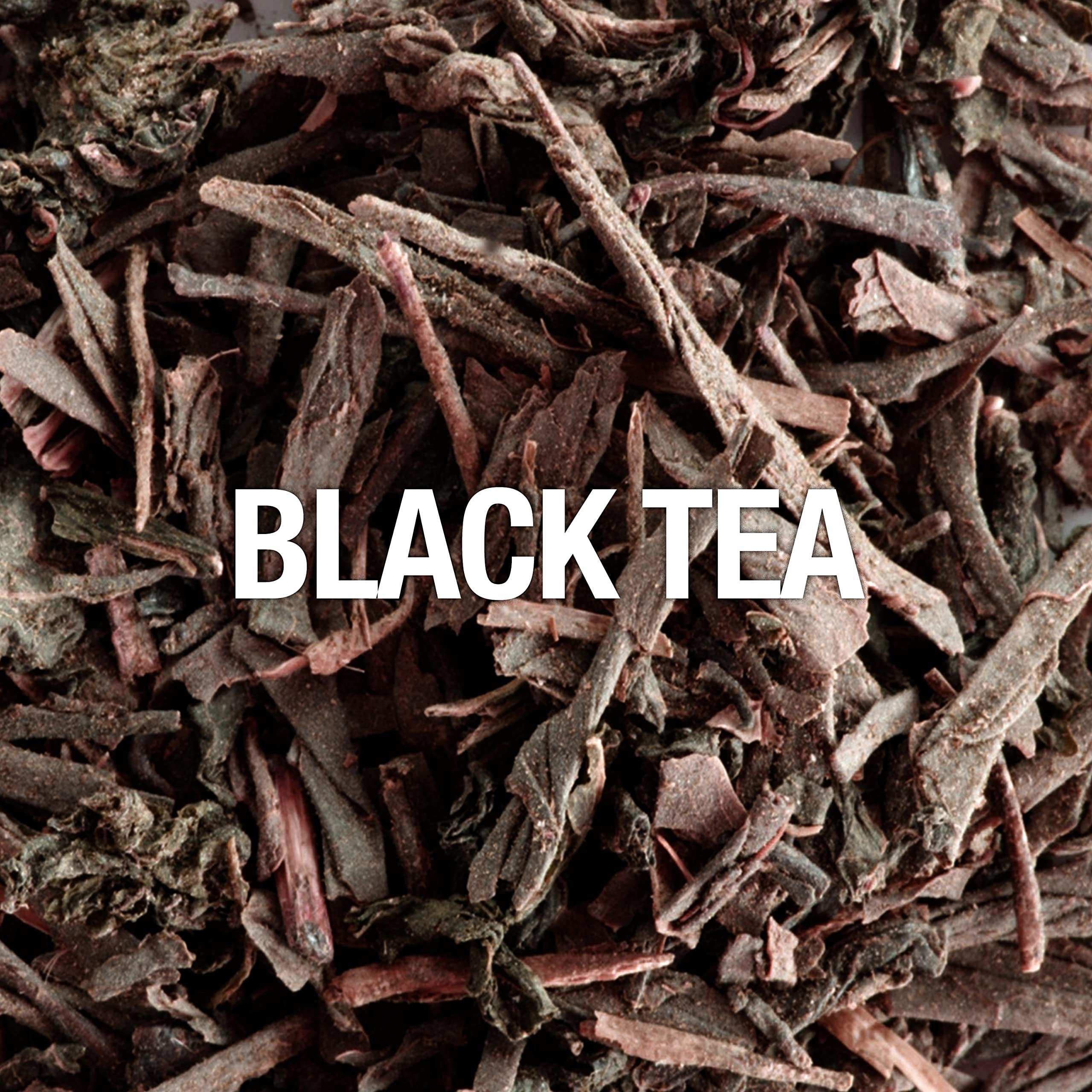 Flat lay of black pepper, black tea, sandalwood beside Curve Connect bottle showing note profile