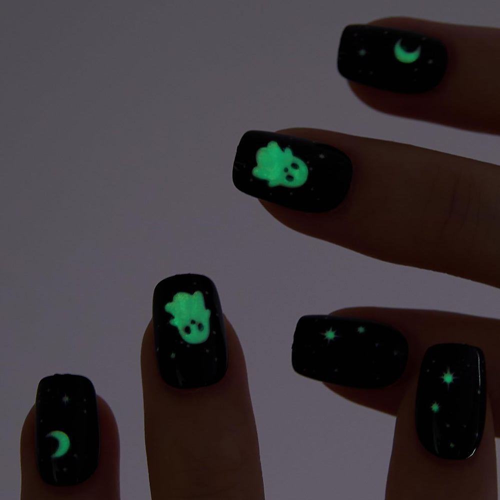 CurvLife nails held in hand to show scale and comfortable short square length