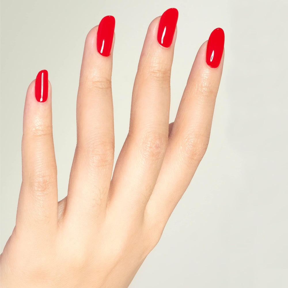 DAISY DND bottle close-up of Ferrari Red gel polish, shows rich pigmentation