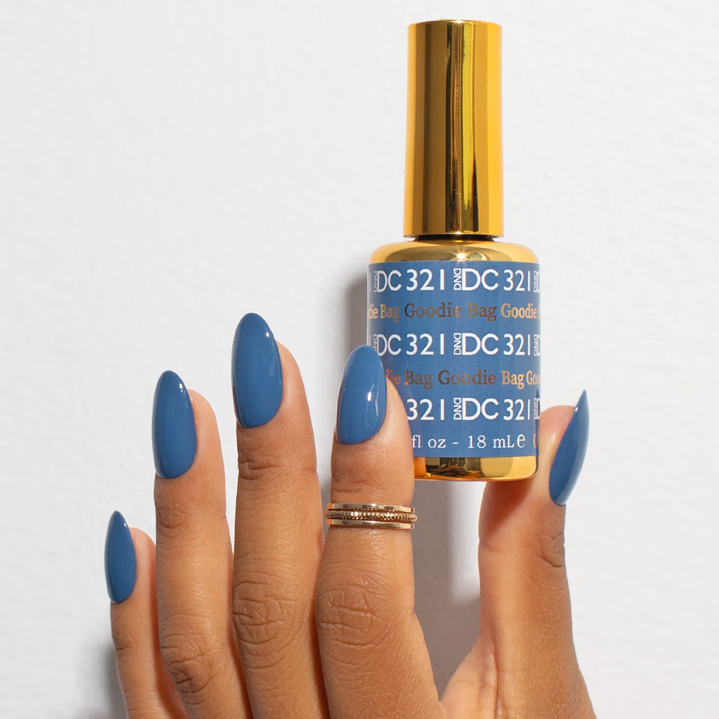 DAISY DND gel and air-dry lacquer bottles side by side, easy matching color benefit
