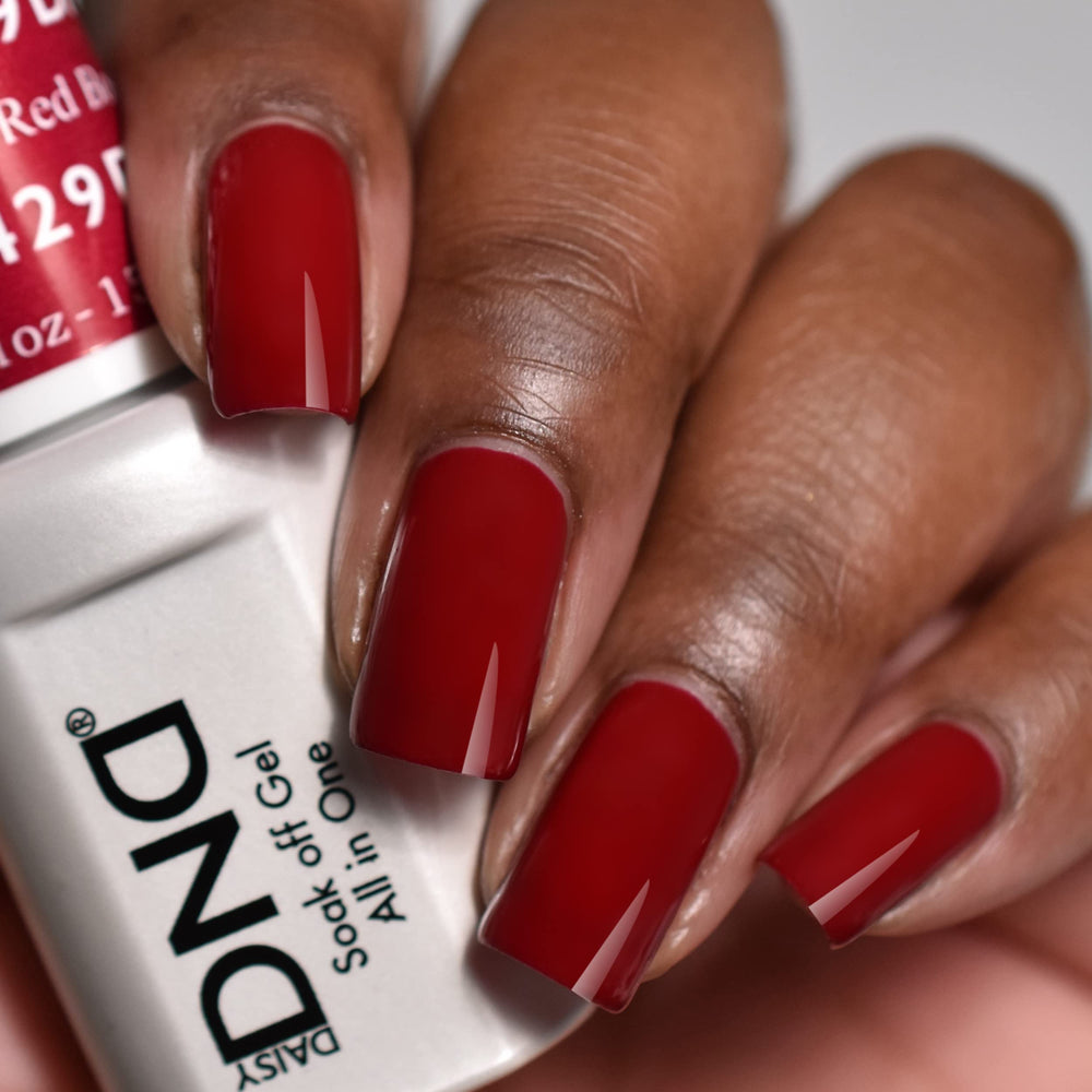 DAISY DND open gel and lacquer bottles with visible brush for precise application