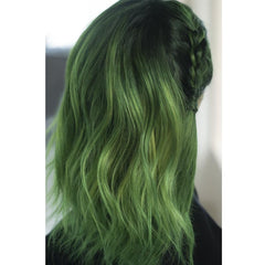 Danger Jones applied on a blonde hair strand showcasing vibrant green payoff and coverage benefit