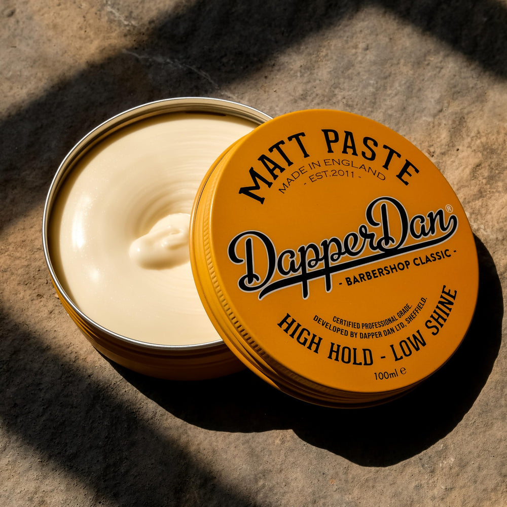 Dapper Dan label closeup showing ingredients and barber-quality reassurance