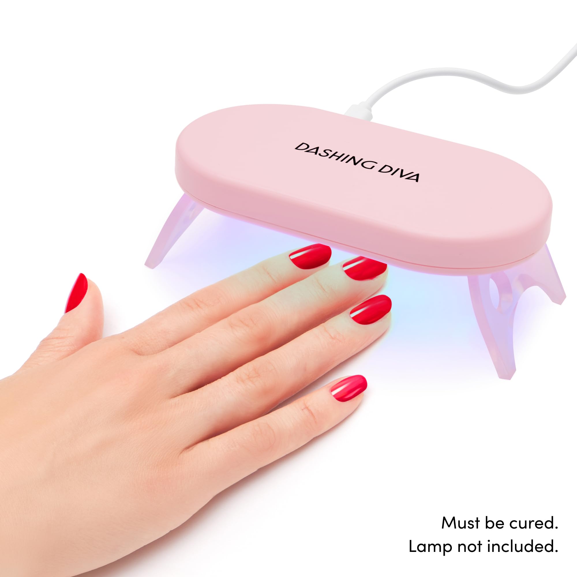 Dashing Diva top coat in a manicure setup showing quick salon-quality results