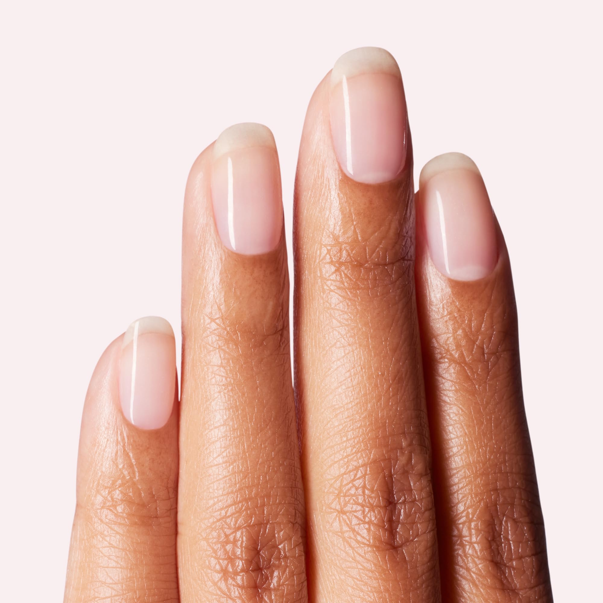 Dashing Diva open bottle with brush demonstrating smooth application and control