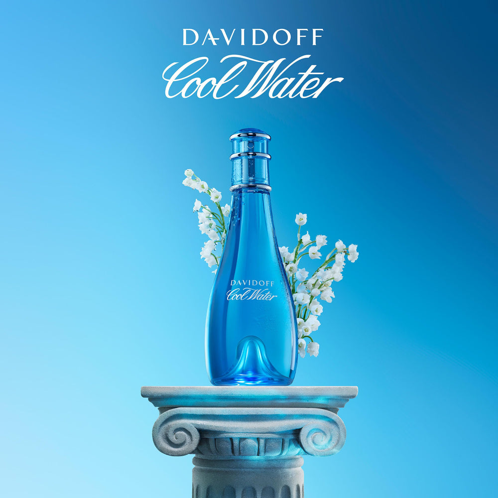 Davidoff Cool Water spritz near lily of the valley close-up conveying floral freshness