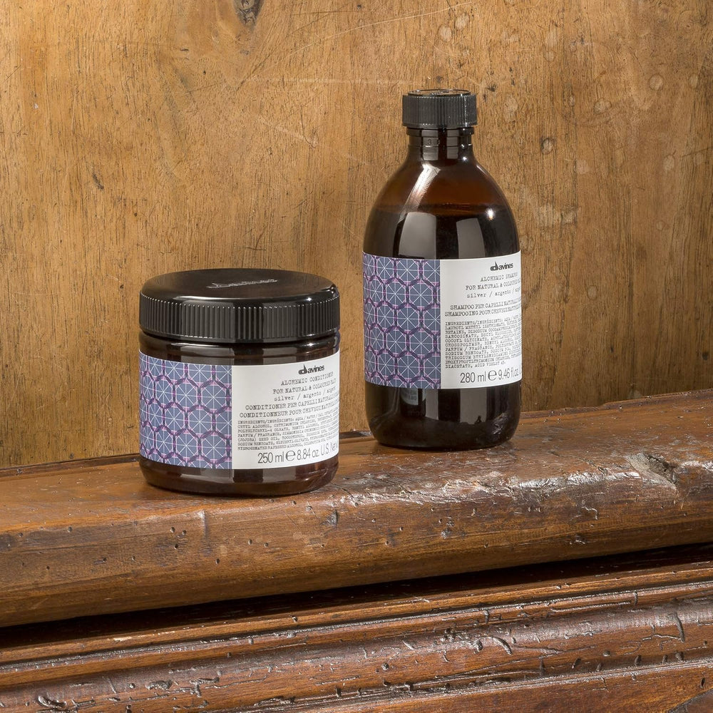 Davines bottle next to common items showing size and portability benefit