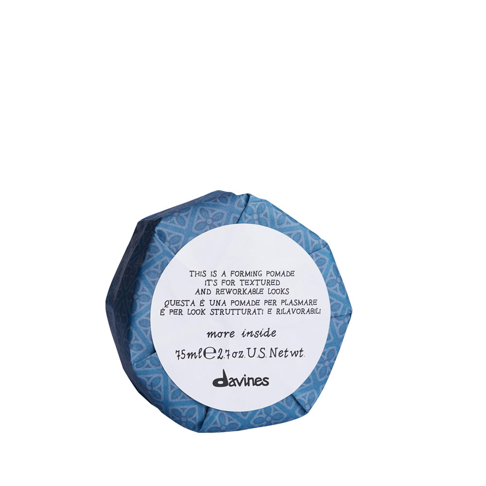 Davines forming pomade paired with other Davines products for layered care routine