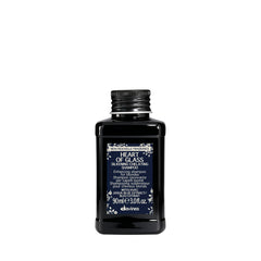Davines travel bottle front packaging showing brand and compact convenience