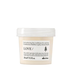 Davines front packaging of LOVE CURL conditioner showing brand and clear benefits