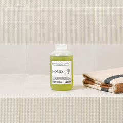 Davines MOMO/ shampoo lather texture showing lightweight foam benefit