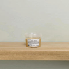 Davines NOUNOU mask cream texture close-up demonstrating rich hydration
