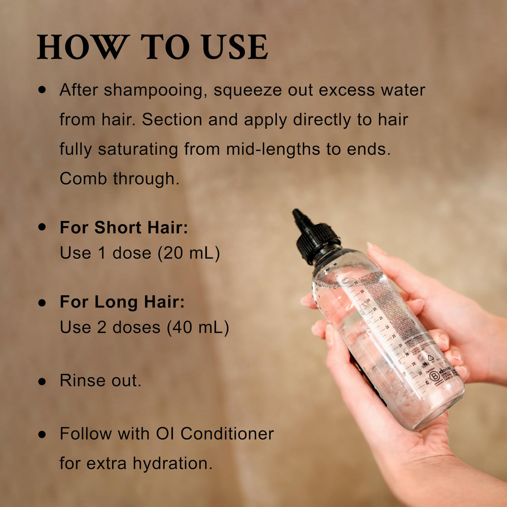 Davines product in hand applied to hair demonstrating smooth application