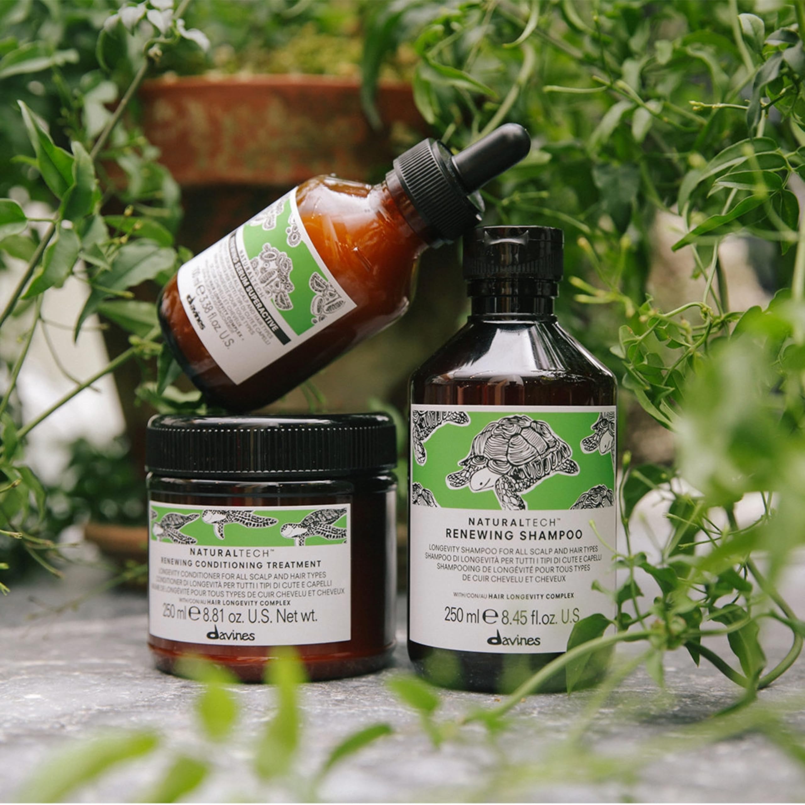 Davines bottle in hand for scale showing travel-friendly size benefit