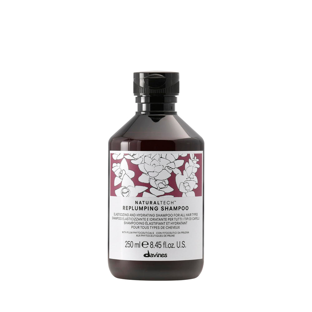 Davines replumping shampoo bottle front view showing premium packaging and salon-grade performance