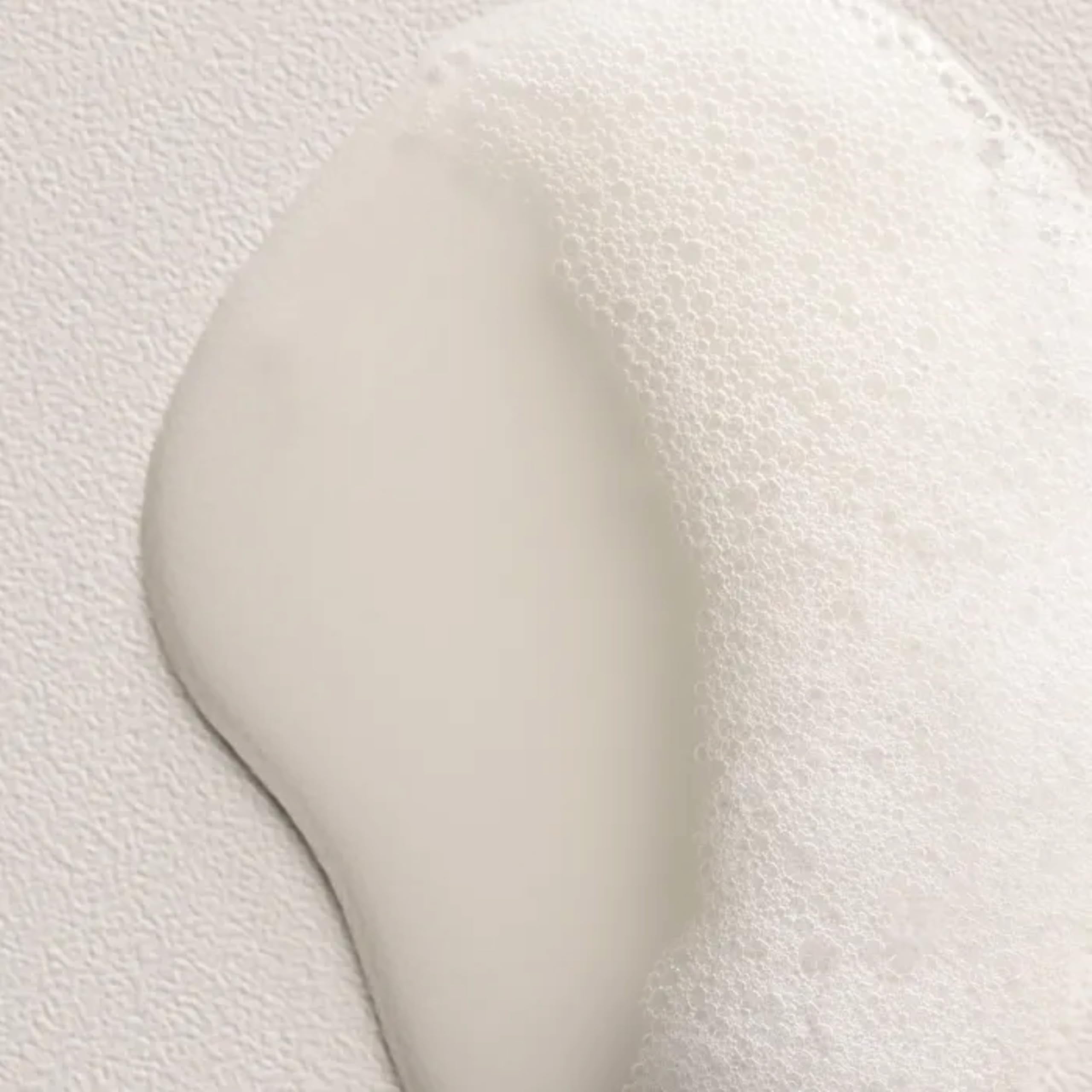 Davines replumping shampoo staged in bathroom lifestyle scene for everyday routine appeal