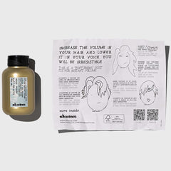 Davines cap open with nozzle showing controlled powder dispense benefit