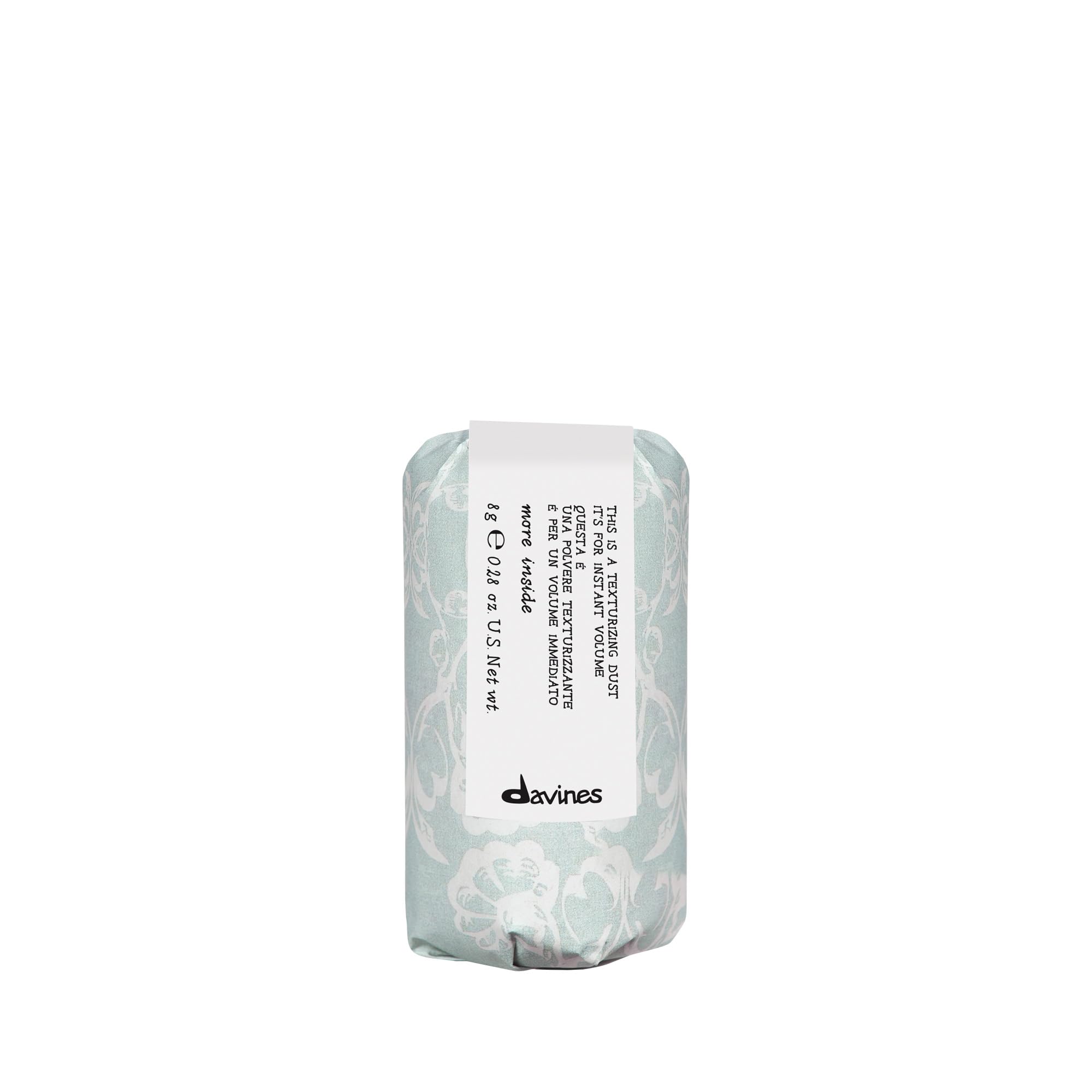 Davines stylist applying powder in salon for textured, workable styles