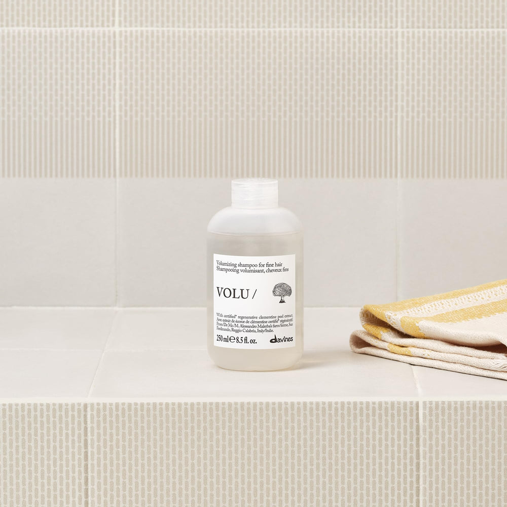 Davines VOLU/ shampoo close-up foam texture demonstrating airy cleansing benefit