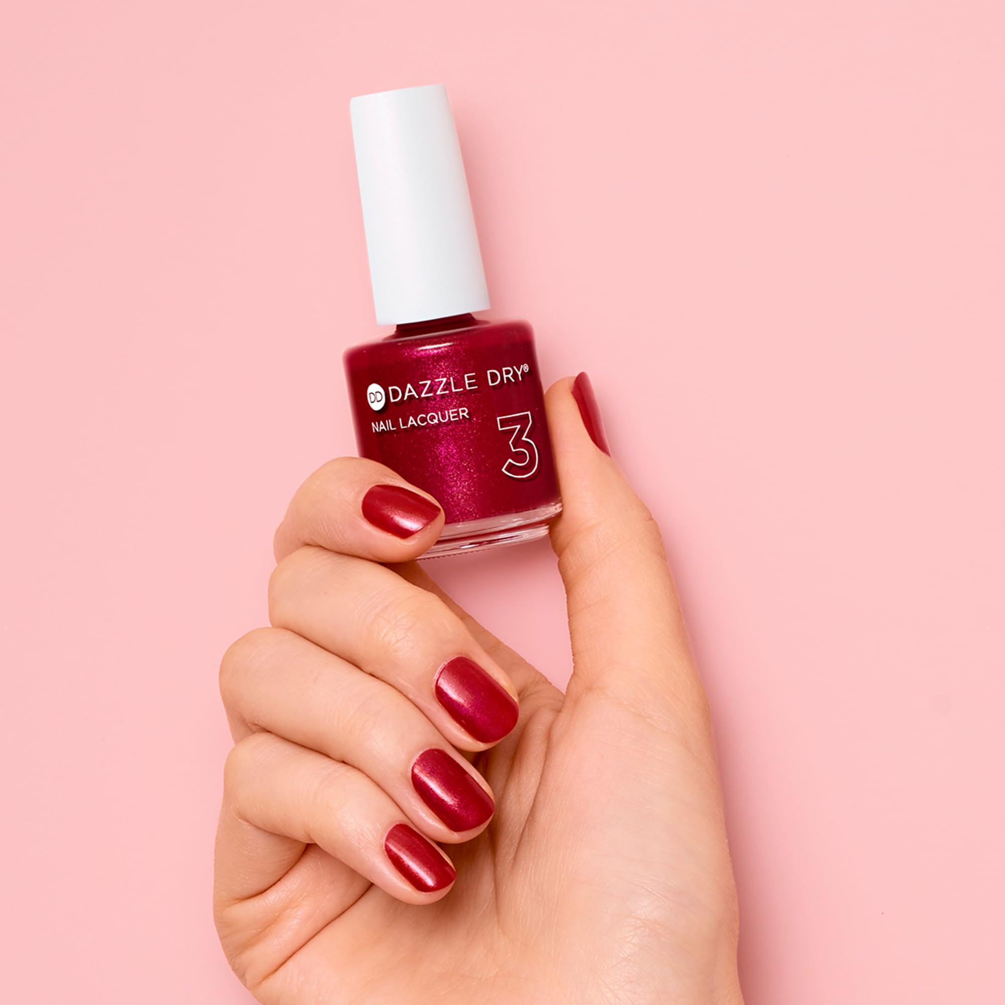 Dazzle Dry painted nails in studio light showing durable glossy finish benefit
