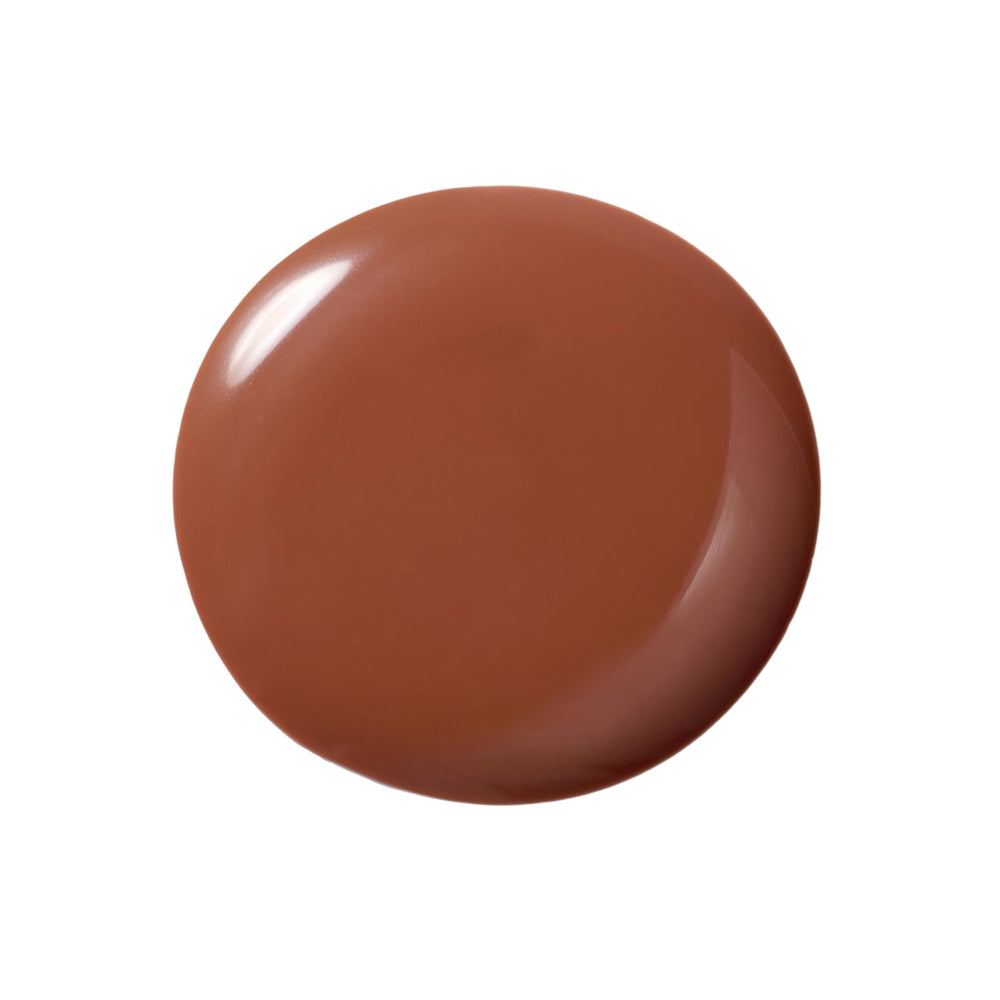 Dazzle Dry brush making a smooth stroke showing Argyle texture benefit: even application
