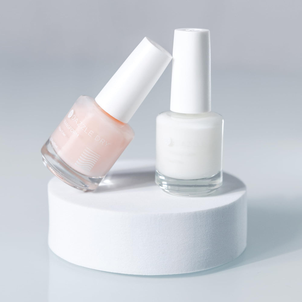 Dazzle Dry bottle held in hand showing 0.5 fl oz compact travel size