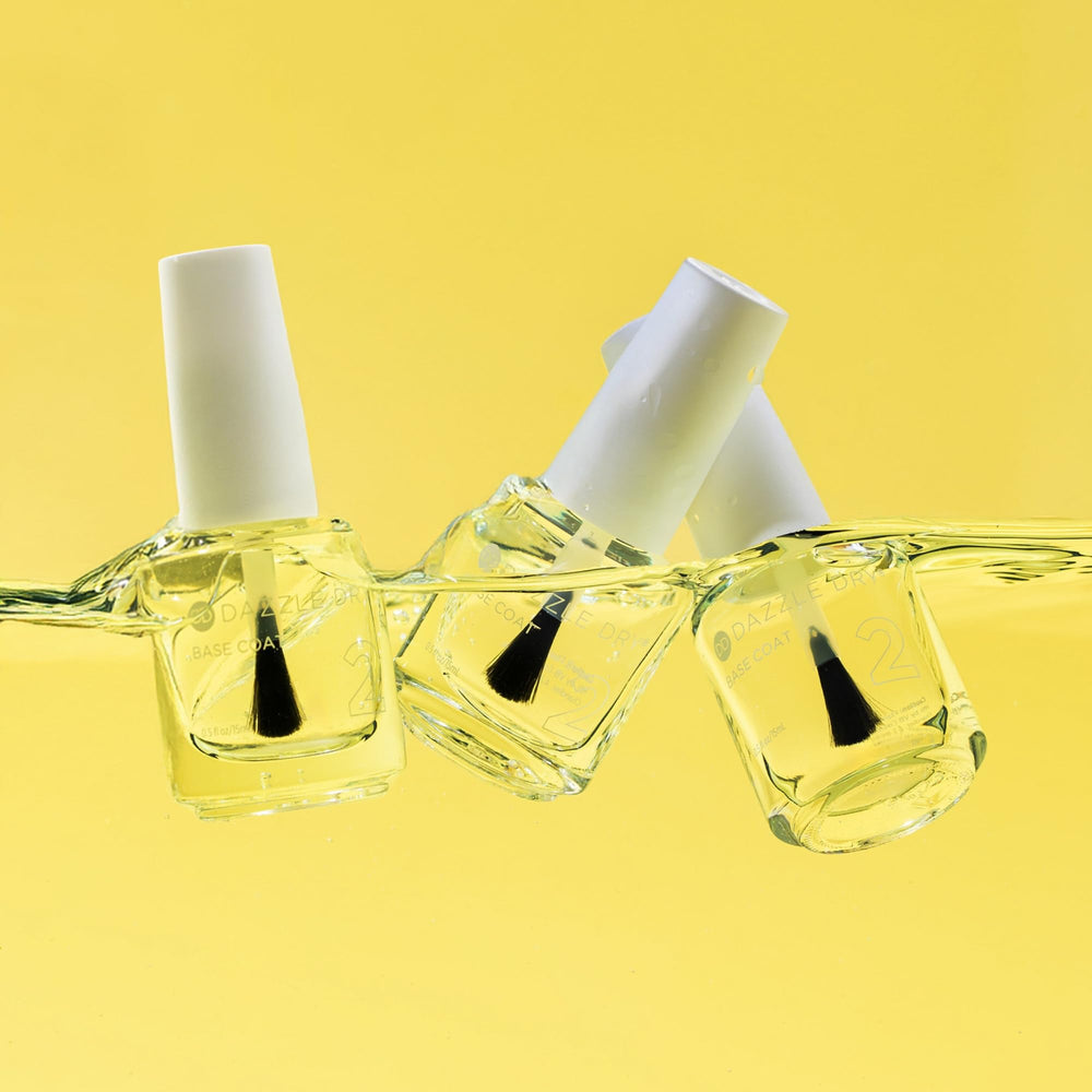 Dazzle Dry pouring clear base coat to show silky, fast-drying benefit