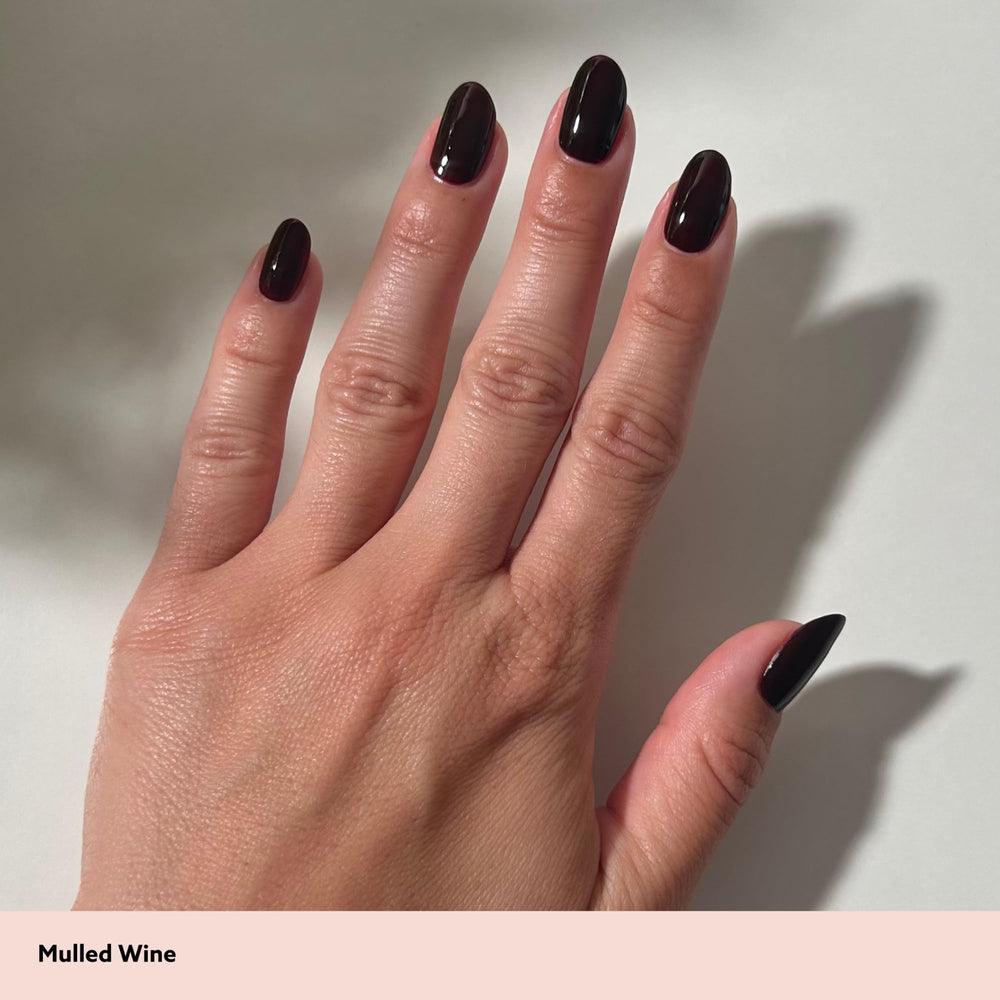 Dazzle Dry lacquer texture close-up Mulled Wine reveals creamy finish and streak-free benefit