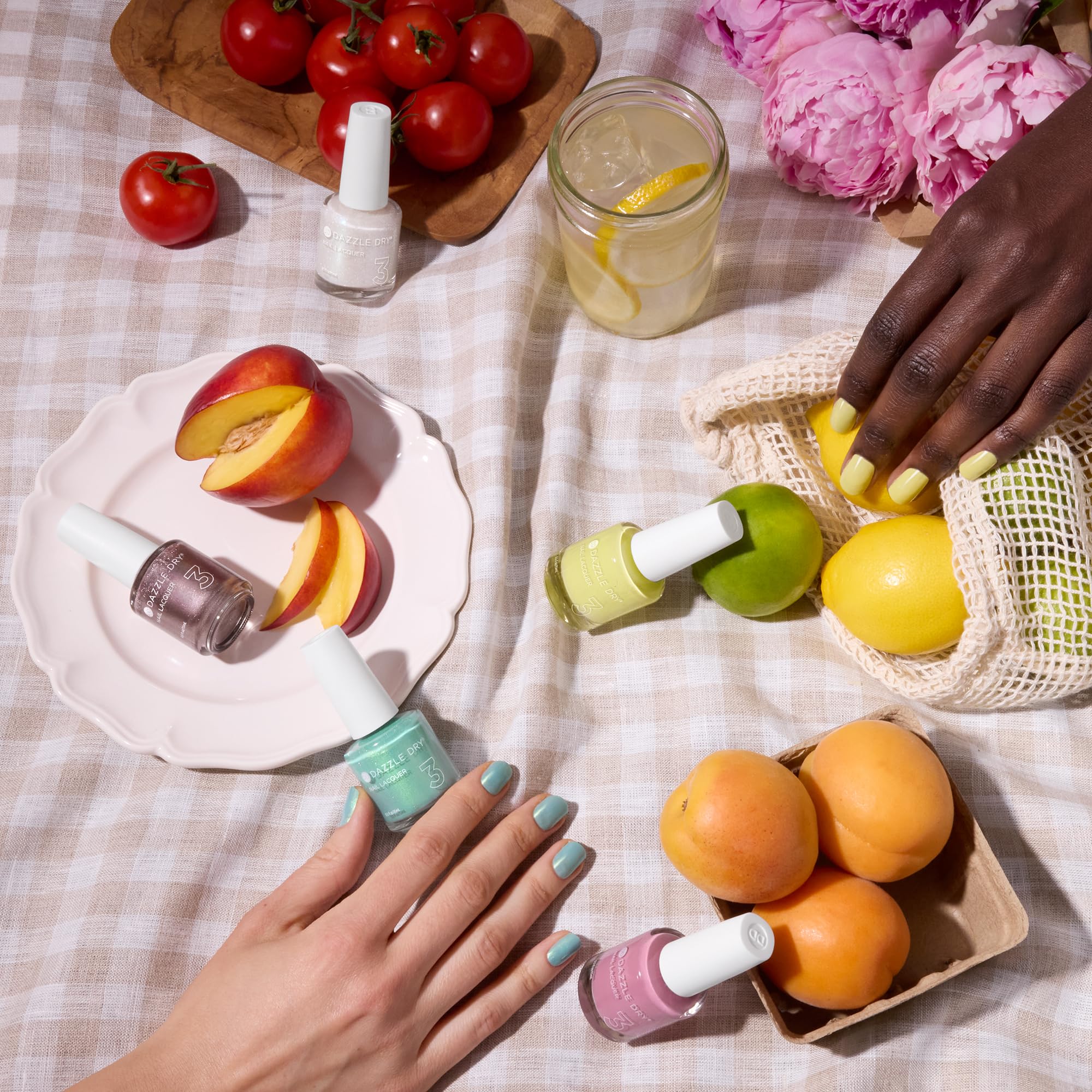 Application of Dazzle Dry Out N' About on a natural nail emphasizing fast-dry smoothness