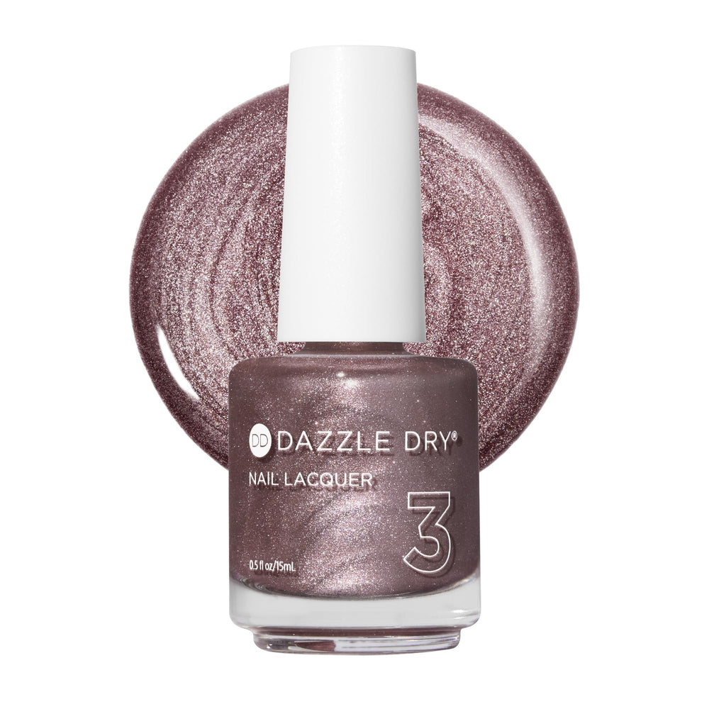 Dazzle Dry Out N' About front bottle view showing rose gold metallic finish and quick-dry benefit