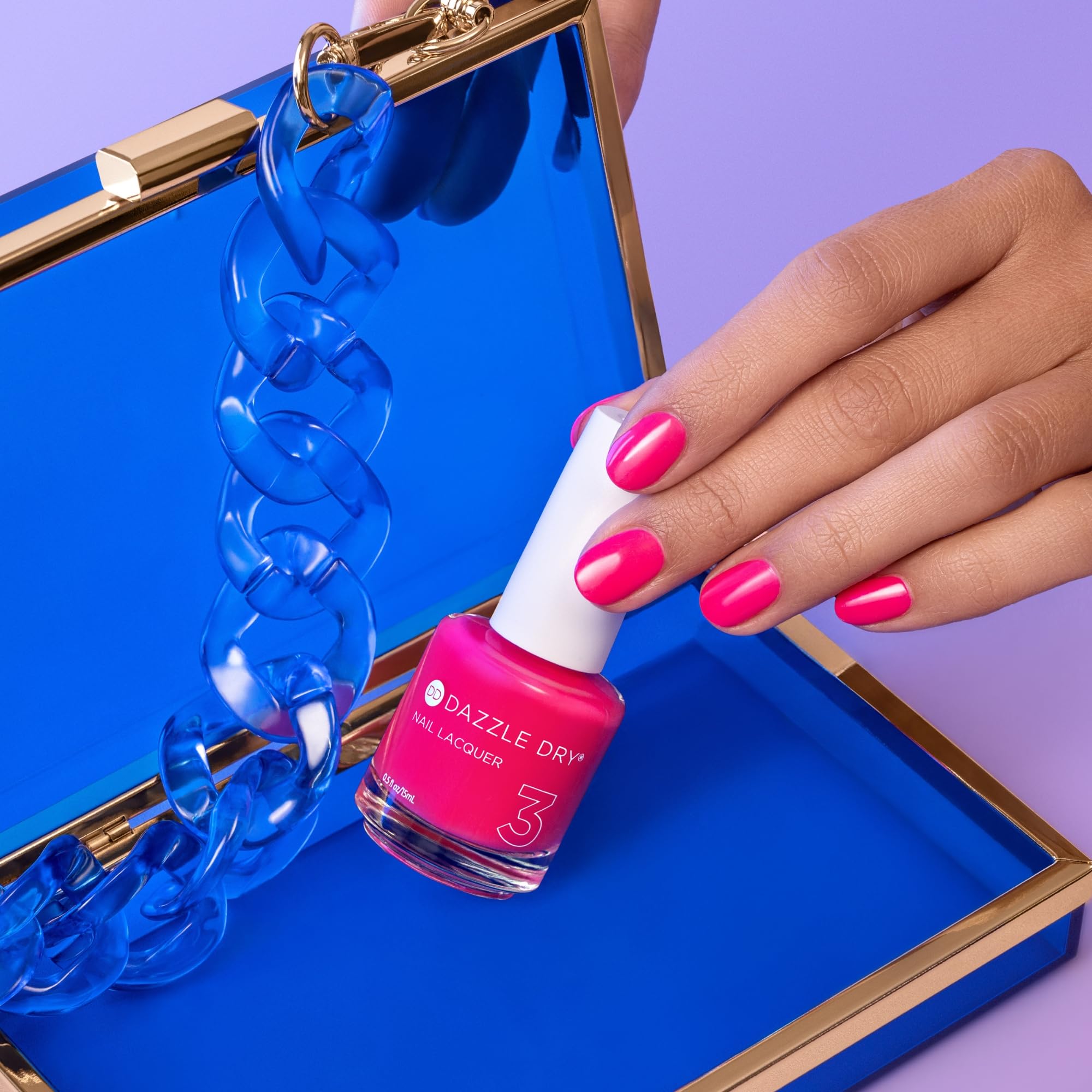 Dazzle Dry polished nails in application stage showing even coverage benefit