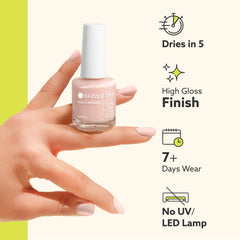 Dazzle Dry 4 fl oz bottle next to ruler for accurate size reference and portability benefit