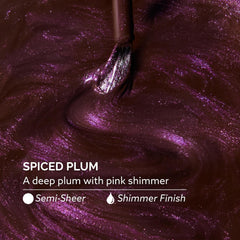 Dazzle Dry bottle on its side displaying lacquer shimmer and rich plum tone