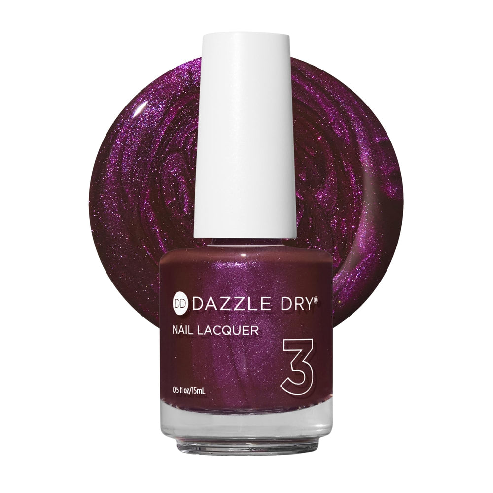 Dazzle Dry front bottle view highlighting Spiced Plum color and quick-dry benefit