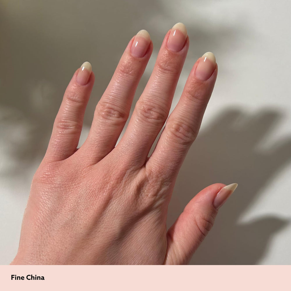 Dazzle Dry Top Coat brush with glossy texture demonstrating fast dry shine