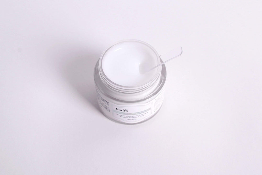 DearKlairs sleeping mask applied beside bed lamp demonstrating overnight nourishment