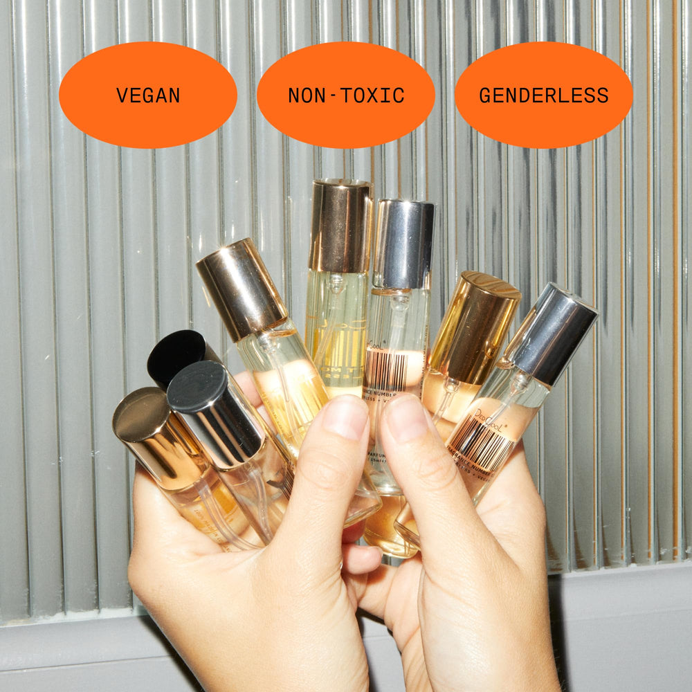 DedCool bottle among travel essentials demonstrating on-the-go refresh practicality